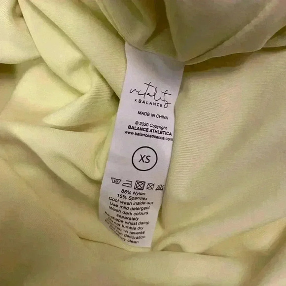 Vitality x Balance Allora High Neck Bodysuit in Pale Yellow Size XS - Picture 7 of 7